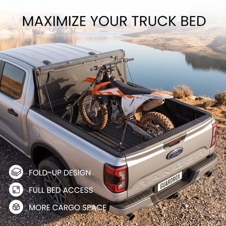 Ford Ranger bed with the LX5 cover propped upright and loaded with mountain bikes for full cargo space