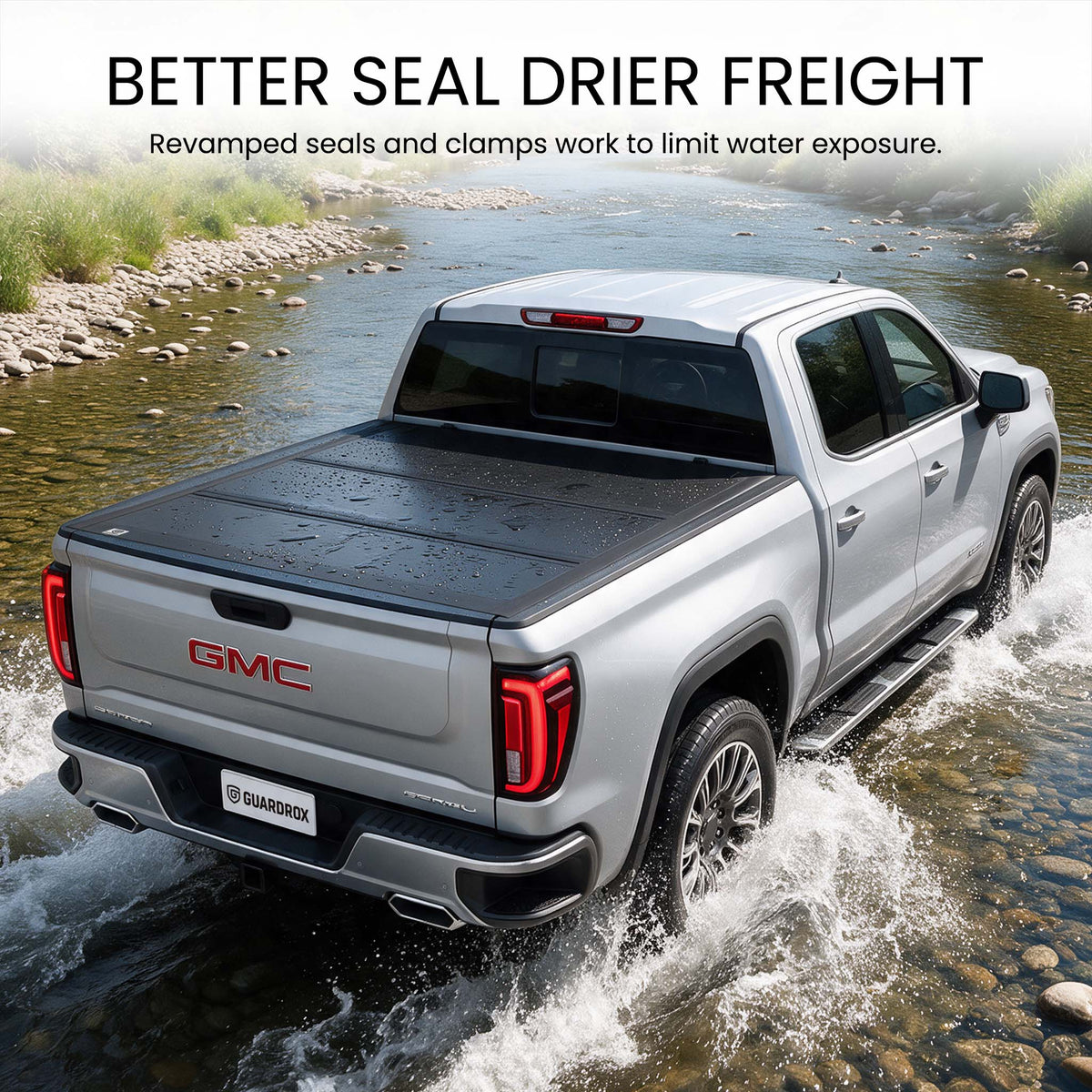 Waterproof hard tri-fold truck bed cover with full-perimeter seals fording a shallow stream
