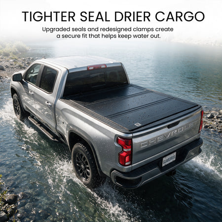 Waterproof flip up tonneau cover with upgraded seals fording a shallow stream