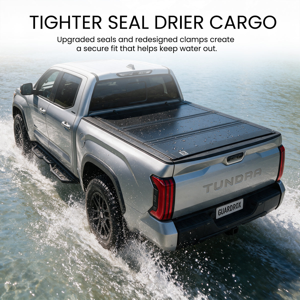 Waterproof flip up tonneau cover with upgraded seals fording a shallow stream