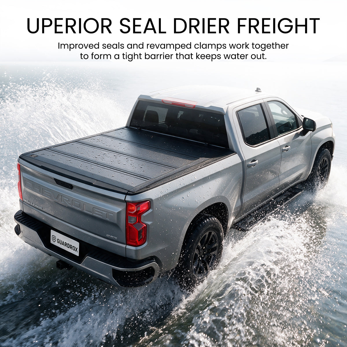 Waterproof hard quad-fold tonneau cover with full-perimeter seals fording a shallow stream
