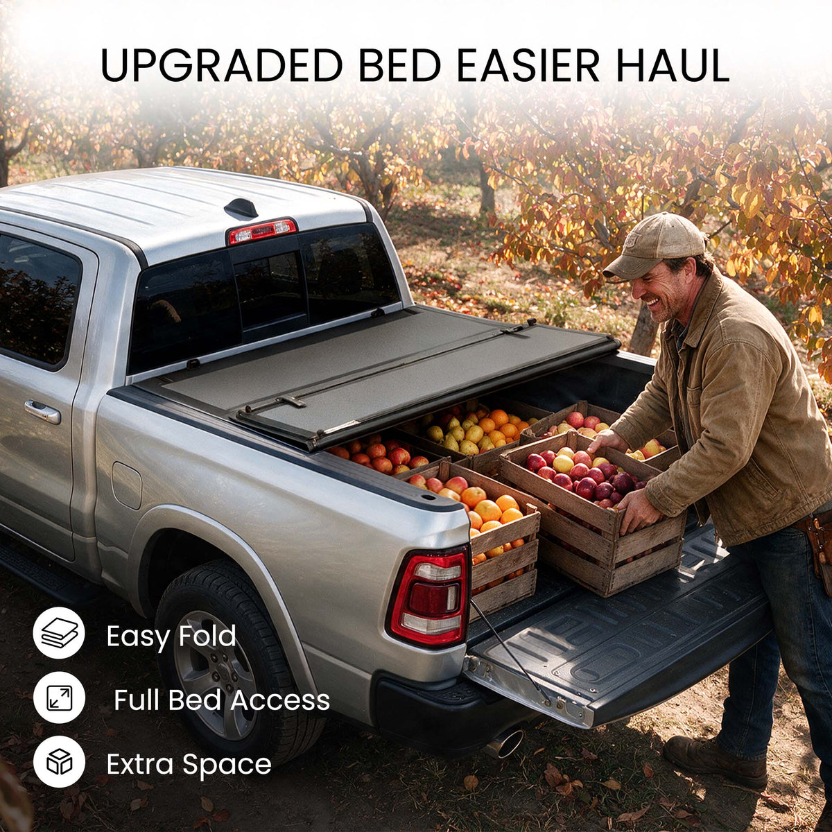 Folding truck bed cover propped open with fruits loaded in a snowy pickup bed