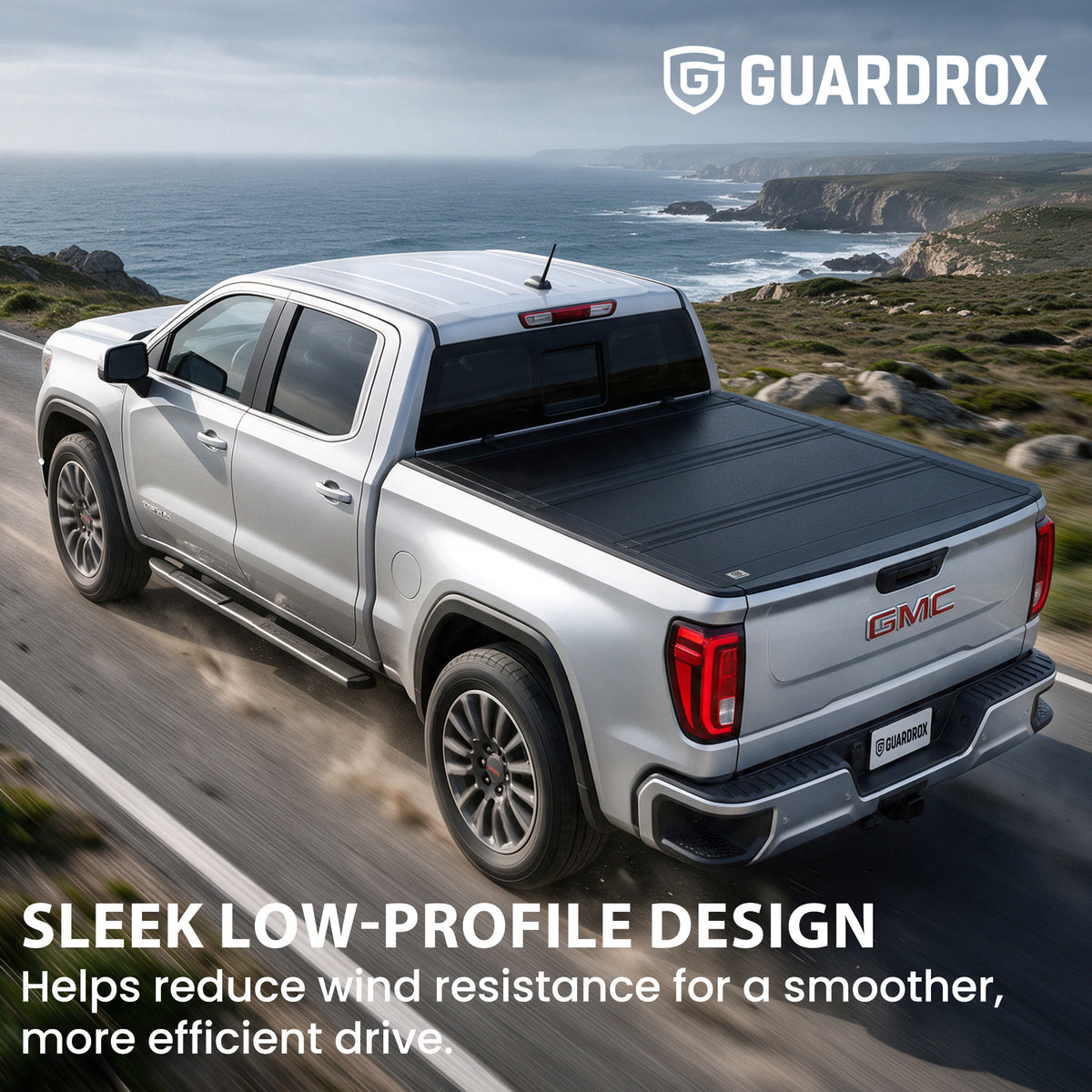 Low profile flip up bed cover riding sleek on a GMC Sierra 1500 cruising a canyon road for less wind drag