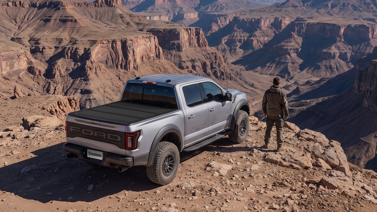 Ford F-150 with Guardrox L5 tonneau cover parked at a canyon overlook on an overlanding trip