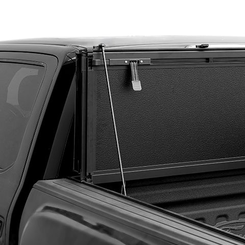 Support rods holding the Guardrox LX5 flip up tonneau cover upright