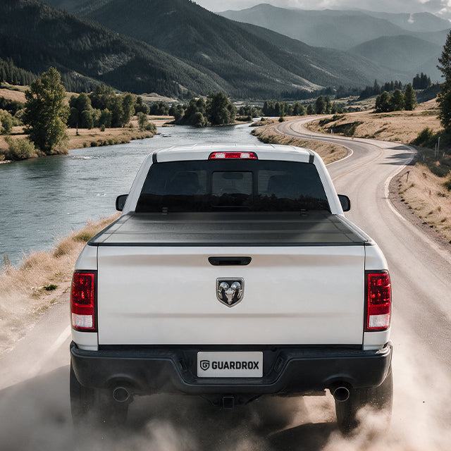 Dodge Ram 1500 Classic with the LX5 flip up cover exploring a gravel mountain trail